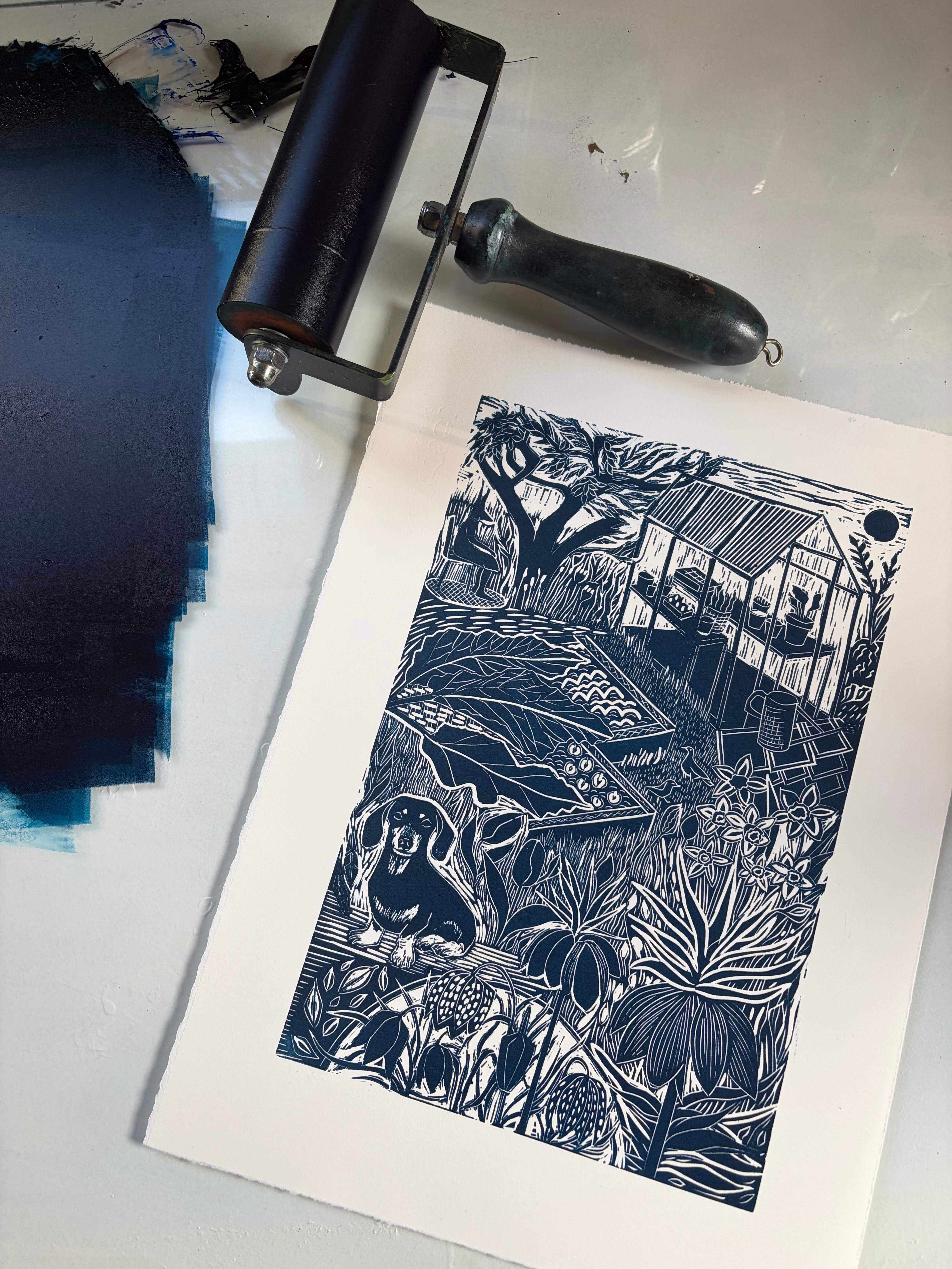 Lino cut print in blue of vegetable garden, Sam Marshall.