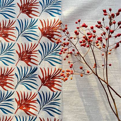 Stencil print design blue leaf and terracotta pine bloom.