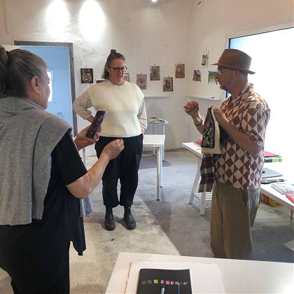 In the studio with students, rug hooking workshop Graham Hollick.