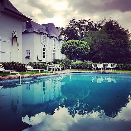 View of the pool, Winery and Manor House at Clos Mirabel