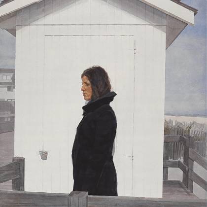 Woman in black coat in front of a white beach hut by artist and painting holidays tutor Mario Andres Robinson.