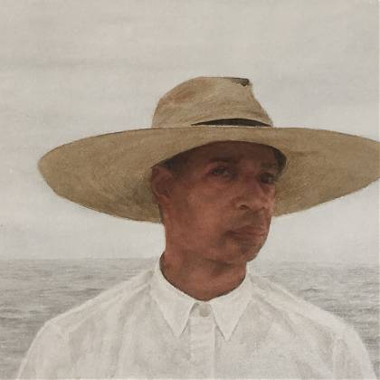 Painting of a man in a wide brimmed hat and white shirt standing in front of the sea.