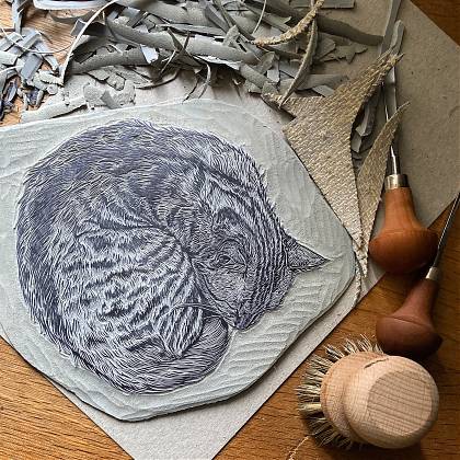 Detail of a Lino cut, sleeping cat design by Lino cut tutor Emily Roberston.