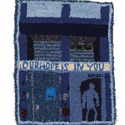 Blue hooked rug with words our hope is in you.
