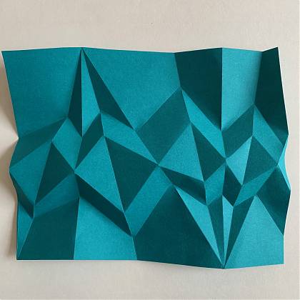 Blue Paper Folding by artist Kate Colin, Tutor at Atelier Clos Mirabel, France.